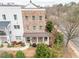 Well-maintained home with covered front porch, landscaping and driveway at 2026 Forte Lane, Alpharetta, GA 30009