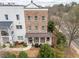 Brick home with covered front porch and manicured landscaping at 2026 Forte Lane, Alpharetta, GA 30009