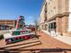 Charming brick apartment building with a sidewalk and colorful art installation nearby at 2026 Forte Lane, Alpharetta, GA 30009