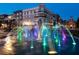 Scenic community park featuring a beautiful fountain illuminated with vibrant colors at twilight at 2026 Forte Lane, Alpharetta, GA 30009