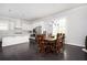 Open-concept living area features a modern kitchen and an adjacent dining area at 2026 Forte Lane, Alpharetta, GA 30009
