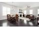 Open living space with a dining area, fireplace and comfortable seating, great for entertaining at 2026 Forte Lane, Alpharetta, GA 30009