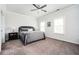Bright main bedroom featuring a large window with a gray color scheme and a ceiling fan at 2026 Forte Lane, Alpharetta, GA 30009