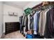 Spacious walk-in closet with extensive shelving and a dresser for ample storage at 2026 Forte Lane, Alpharetta, GA 30009