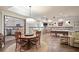 Finished basement area featuring a pool table, dining area, and a partial kitchen with modern finishes at 515 Saint Barbaras Nw Ln, Marietta, GA 30064