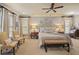Spacious bedroom with neutral tones, plush carpet, large bed, and decorative accents; creating a warm and inviting atmosphere at 515 Saint Barbaras Nw Ln, Marietta, GA 30064