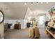Multi-purpose bonus room with ample natural light, neutral carpet and versatile display furniture at 515 Saint Barbaras Nw Ln, Marietta, GA 30064