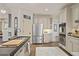 Well-equipped kitchen with stainless steel appliances, custom cabinets, and dark countertops, offering both style and functionality at 515 Saint Barbaras Nw Ln, Marietta, GA 30064