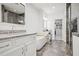 Bright bathroom features a soaking tub, walk-in shower, double granite vanity, and access to the walk-in closet at 6838 Prelude Dr, Atlanta, GA 30328