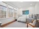 Comfortable bedroom with natural light, neutral tones, and hardwood floors at 6838 Prelude Dr, Atlanta, GA 30328