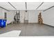 Spacious garage with epoxy flooring and plenty of room for storage and vehicles at 6838 Prelude Dr, Atlanta, GA 30328
