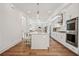 Contemporary kitchen with granite countertops, stainless appliances and a center island with seating at 6838 Prelude Dr, Atlanta, GA 30328