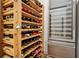 Stylish wine storage area with wooden racks and stainless steel wine fridge at 6838 Prelude Dr, Atlanta, GA 30328