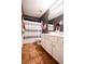 Bathroom features a combination shower and tub, modern tile flooring, and updated fixtures at 855 Hood Rd, Fayetteville, GA 30214