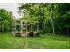 Well maintained outdoor garden with a wooden-framed structure, enhancing the property's landscape at 855 Hood Rd, Fayetteville, GA 30214