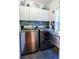Convenient laundry room with modern washer and dryer and ample cabinet space at 855 Hood Rd, Fayetteville, GA 30214