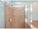 Walk-in shower is tiled and has glass door for easy access at 411 Mountain View Ln, Woodstock, GA 30188
