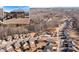 Overhead neighborhood shot showcases a scenic pond, mature trees, community pool, and well-maintained streets at 5915 Partners Pass, Cumming, GA 30028