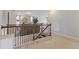 Second floor hallway with view of the stairs at 5915 Partners Pass, Cumming, GA 30028