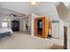 This main bedroom boasts a sauna, neutral walls, and tray ceilings at 5915 Partners Pass, Cumming, GA 30028