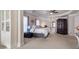 This main bedroom showcases neutral walls and tray ceilings for a modern look at 5915 Partners Pass, Cumming, GA 30028