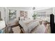 Relaxing bedroom featuring multiple windows and a ceiling with recessed lighting and decorative chandelier at 7880 Brands Hatch Blvd, Cumming, GA 30040