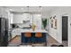 Charming kitchen with white cabinets, a center island, and stainless steel appliances at 7880 Brands Hatch Blvd, Cumming, GA 30040