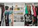 Organized walk-in closet with custom shelves and clothing racks at 7880 Brands Hatch Blvd, Cumming, GA 30040