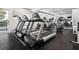 Well-equipped fitness center with treadmills, exercise bikes, and ample workout space at 1075 Peachtree Walk # A205, Atlanta, GA 30309