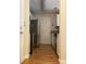 Kitchen showing stainless steel appliances with wood-look flooring at 1075 Peachtree Walk # A205, Atlanta, GA 30309
