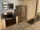 Kitchen featuring stainless steel appliances and granite countertops at 1075 Peachtree Walk # A205, Atlanta, GA 30309