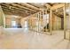 Unfinished basement featuring exposed beams, concrete foundation, and stud framed walls at 2031 Broadmoor Way, Fairburn, GA 30213