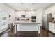 Modern kitchen with stainless steel appliances, granite countertops, and center island at 2031 Broadmoor Way, Fairburn, GA 30213