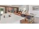 Bright kitchen with stainless steel faucet, quartz countertop, and dining area at 2344 Belmont Dr, Decatur, GA 30032