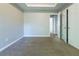 Carpeted bedroom featuring neutral paint and a doorway to another room at 2931 Two Lake Cir, Atlanta, GA 30349