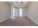 Spacious bedroom with neutral paint, plush carpet, and trey ceiling with fan at 2931 Two Lake Cir, Atlanta, GA 30349