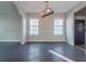 Open dining room featuring hard wood flooring and natural light at 2931 Two Lake Cir, Atlanta, GA 30349
