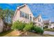 Angle view displaying lush lawn, trees, and the home's exterior at 2931 Two Lake Cir, Atlanta, GA 30349