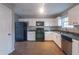 Well-equipped kitchen featuring appliances, ample counter space, and classic cabinets at 2931 Two Lake Cir, Atlanta, GA 30349