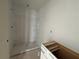Bathroom with walk-in shower and white cabinets, ready for customization at 4428 Ryan St, Douglasville, GA 30135