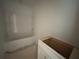 Unfinished bathroom with a new white tub and shower combo, ready for final fixtures and a modern vanity at 4428 Ryan St, Douglasville, GA 30135