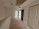 Upstairs hallway with several doors to bedrooms and bathrooms at 4428 Ryan St, Douglasville, GA 30135