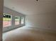 Spacious unfinished room with ample natural light, perfect for customization and design at 4428 Ryan St, Douglasville, GA 30135