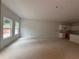 Large unfinished interior with kitchen cabinets installed, ready for personalization and finishing touches at 4428 Ryan St, Douglasville, GA 30135