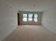 Spacious living room featuring large windows and plenty of natural light at 4428 Ryan St, Douglasville, GA 30135