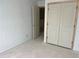 A room with an open closet and a neutral color scheme provides a serene backdrop for personal design preferences at , Douglasville, GA 30135