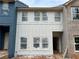 Exterior of new construction home showing the board and batten siding and brick details at , Douglasville, GA 30135