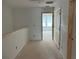 Bright hallway with natural light and neutral color palette, awaiting personal touches at , Douglasville, GA 30135