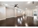 Large bonus room featuring hardwood floors, a ceiling fan, and ample space at 10580 Grandview Sq, Johns Creek, GA 30097
