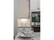 Close-up of white cabinets and stainless steel appliances in a modern kitchen at 10580 Grandview Sq, Johns Creek, GA 30097